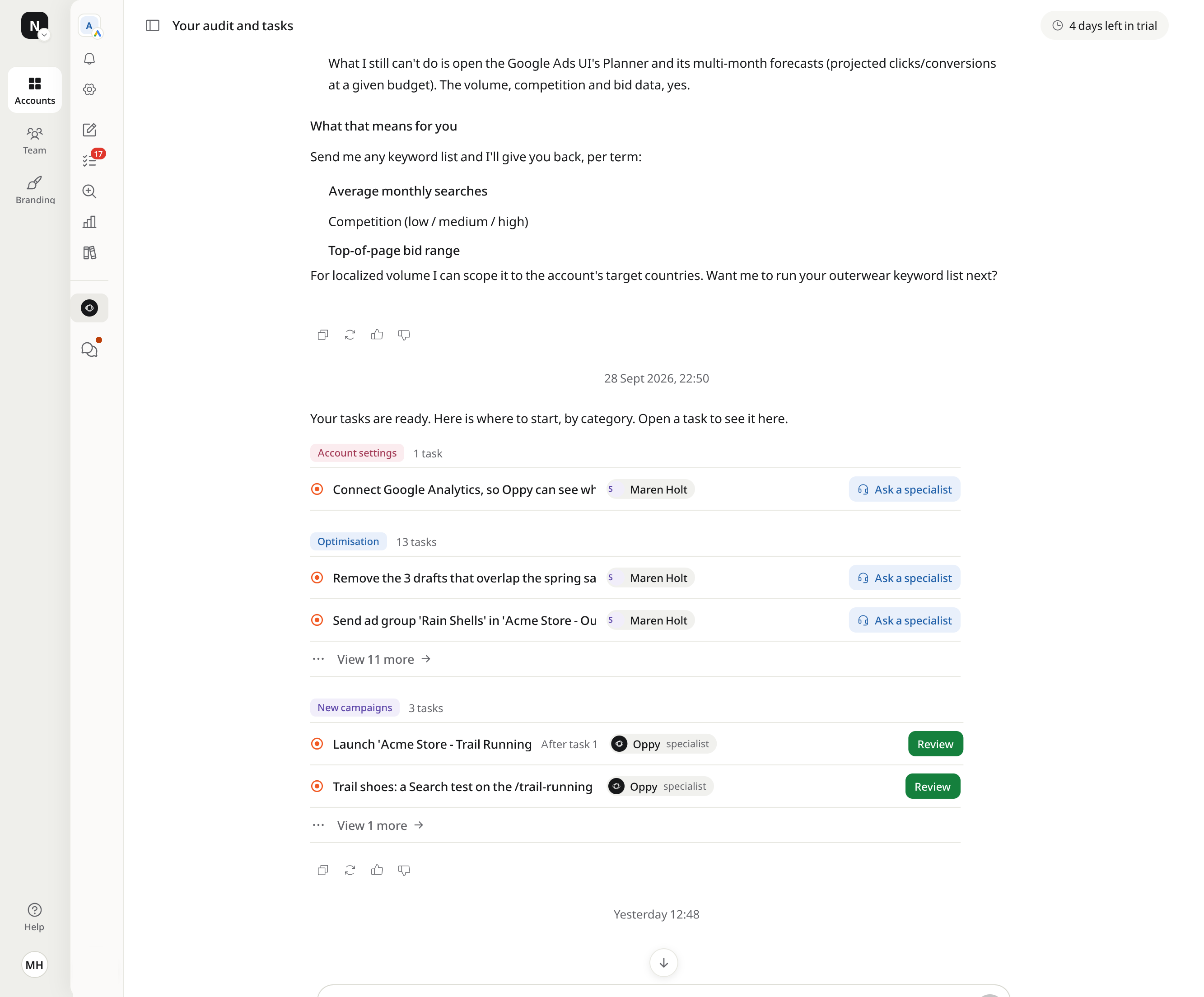 A thread in Optizads: Oppy answers a question about search volumes, then lists the tasks it created by category